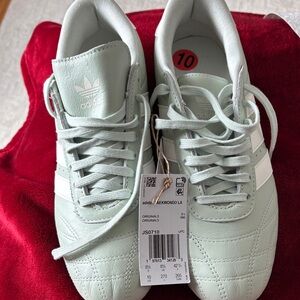 Adidas Light Green Originals with White Stripes